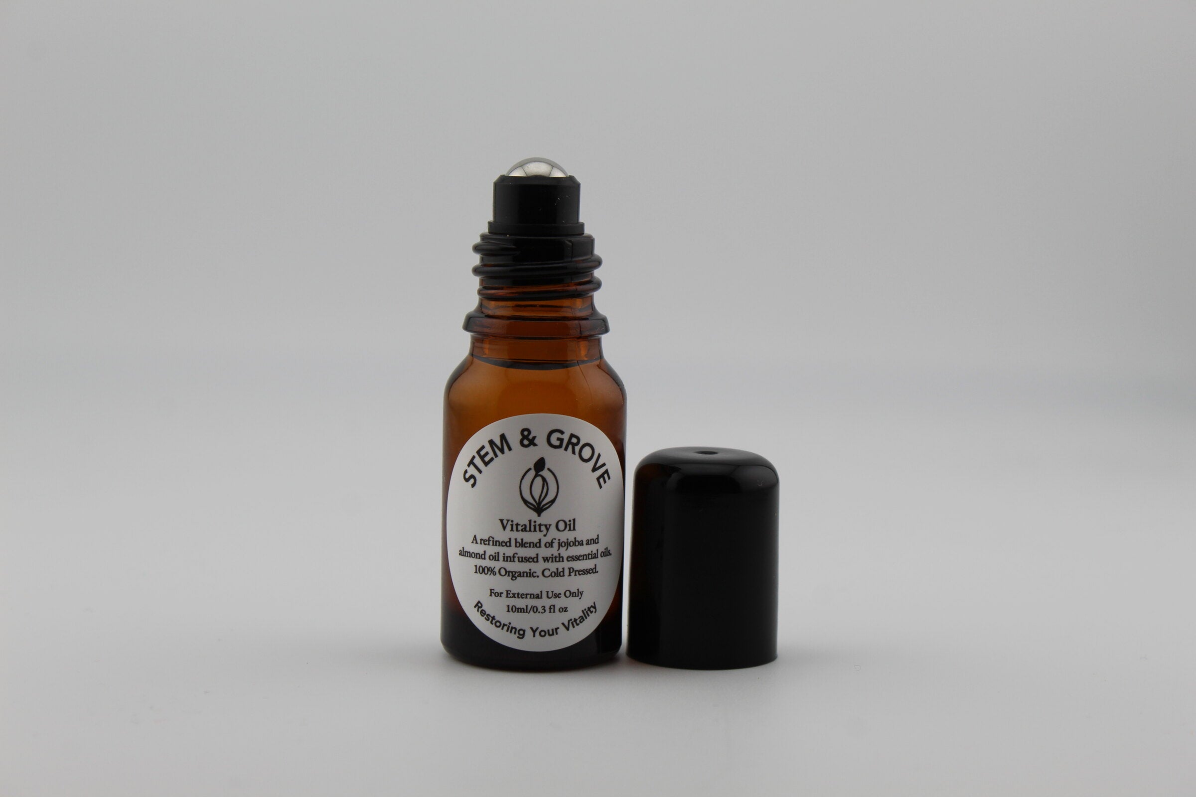 Stem & Grove Vitality Oil roll-on applicator detail with cap off