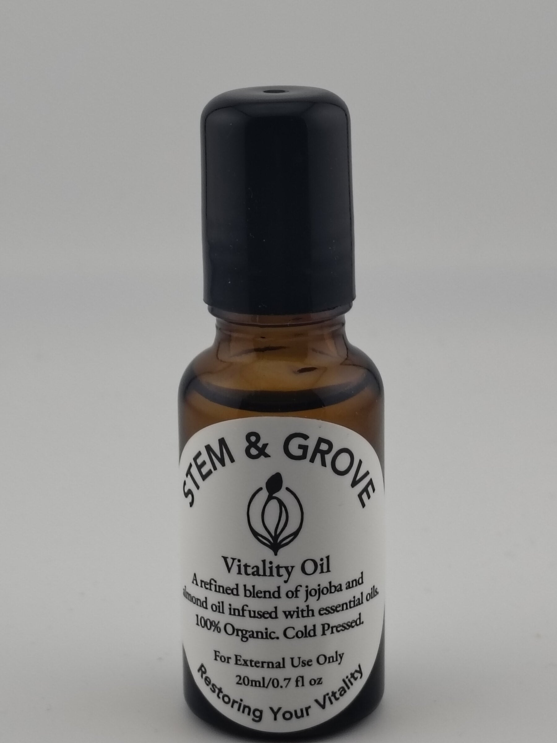 Stem & Grove Vitality Oil label close-up showing ingredients and size